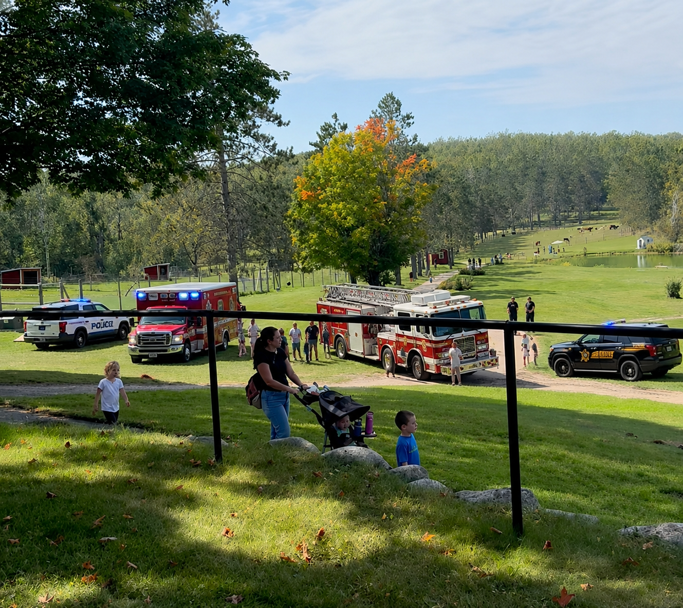 Fire trucks and rescue vehicles parked at Wilderness Valley Farm in Gaylord, Michigan