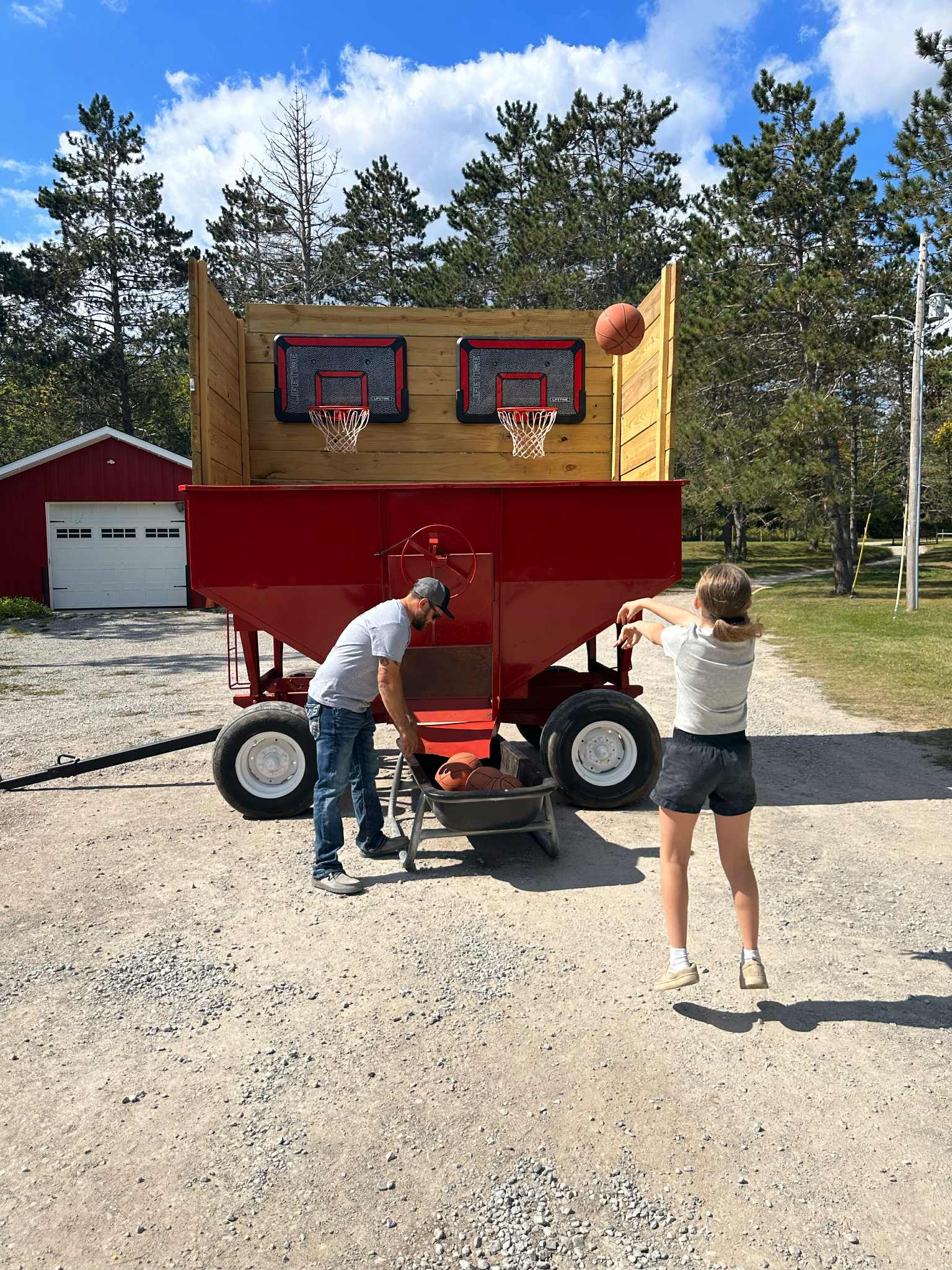 Kids competing in Farm Olympics games at Wilderness Valley Farm in Gaylord, Michigan